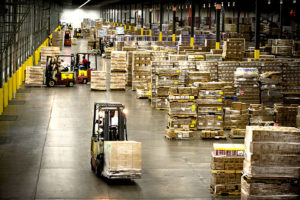 Warehouse with forktrucks - A good warehouse management system can help inventory accuracy, but only if you're already good at it.