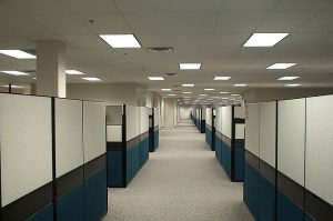 Empty cubicles after a layoff. You can make smart layoffs if you use objective measurement to find the best and worst employees.