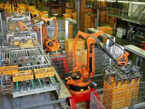 Robots in a German factory palletizing bread. This is a good example of manufacturing automation.