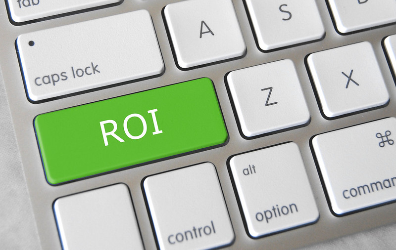 A green ROI button on a laptop. There are times you need to put other factors before ROI.