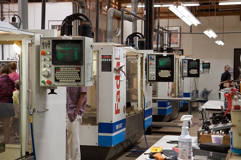 Worker retraining can help unskilled workers learn to use more complex machines like this CNC router.