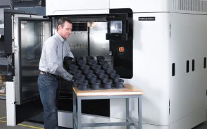 Industrial 3D printer. A machine like this can help you with small batch sizes on rush orders.