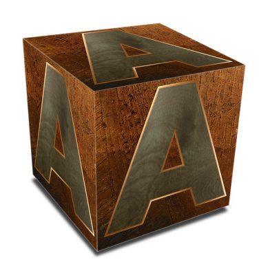A photo of a fancy wooden block with the letter A on all three sides. This is a metaphor for a blockchain block.