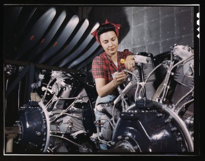 Woman working on a plane at the North American Aviation plant
