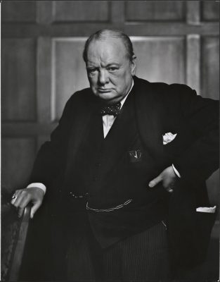 Sir Winston Churchill. Whatever else you could say about him, he had a cool head in a crisis and he made sure he was seen by the British public during WWII.