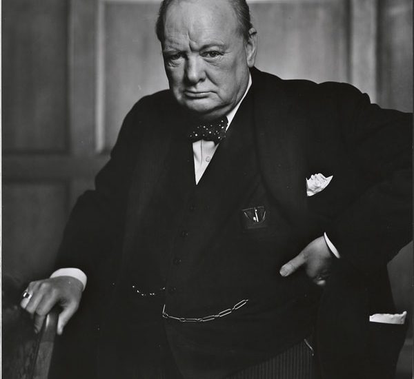 Sir Winston Churchill. Whatever else you could say about him, he had a cool head in a crisis and he made sure he was seen by the British public during WWII.