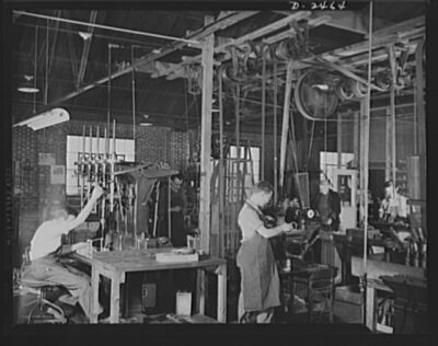 A photo of an old floor waxer factory. Modern manufacturing has come a long way from this.