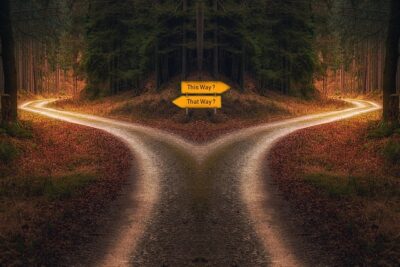 A crossroads with signs pointing in either direction that say This Way or That Way? How do you lead through ambiguity like this?